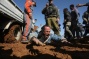 Israeli soldiers drive tractor over worker’s legs to stop Palestinians from building a house on their (occupied) lands